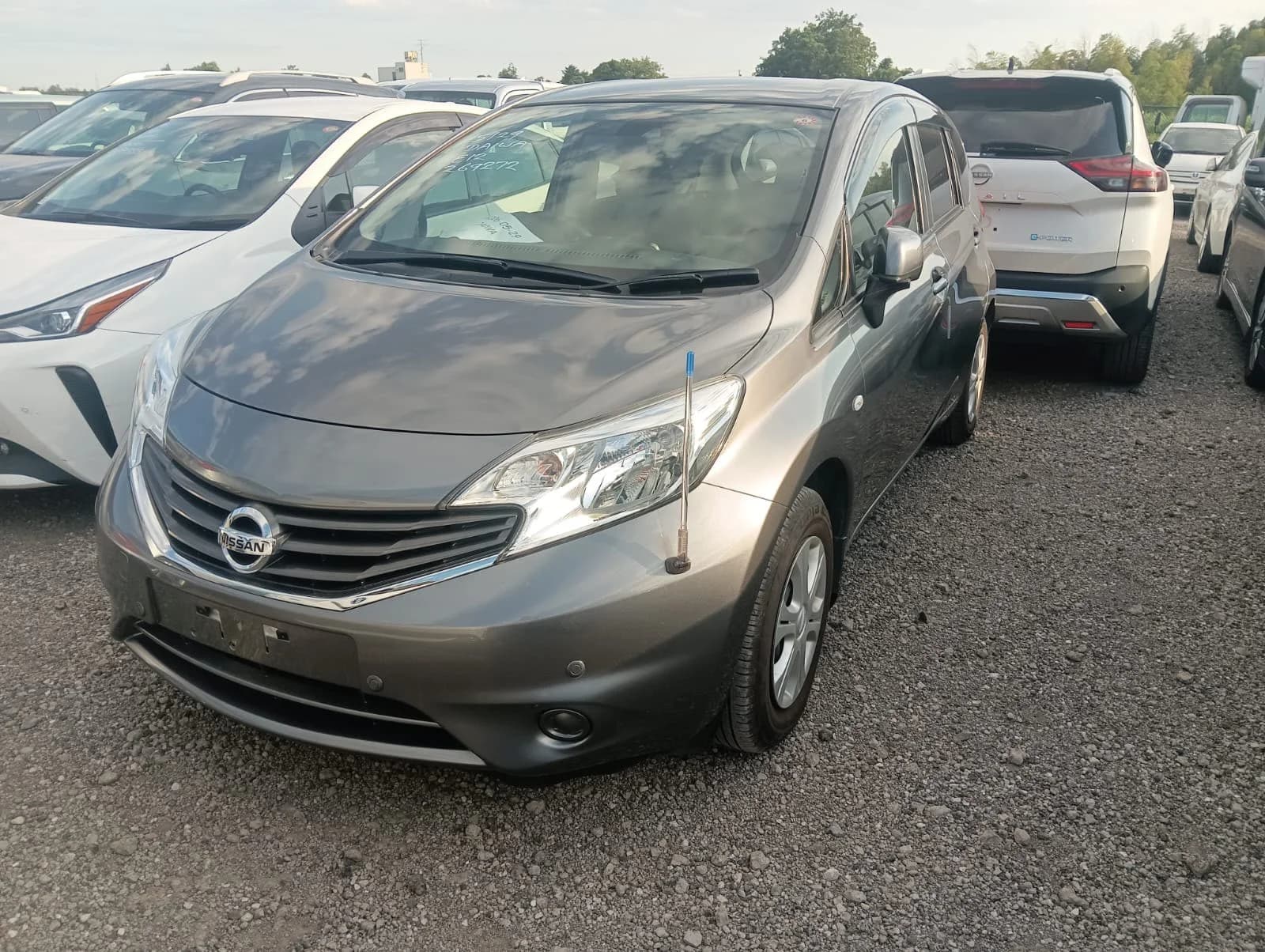 Compact sedan front-left three-quarter view