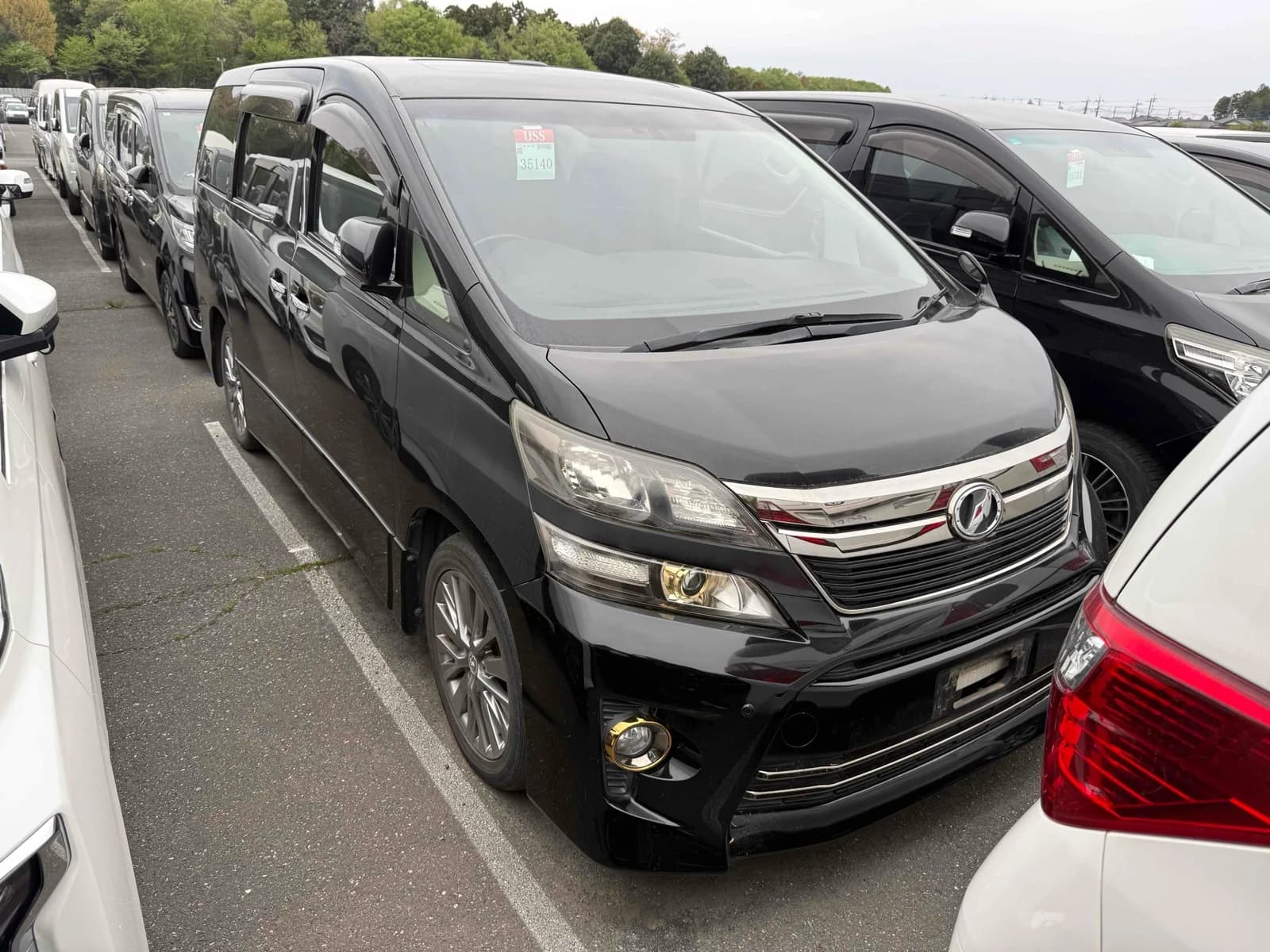 Toyota Vellfire luxury minivan front-left three-quarter exterior view