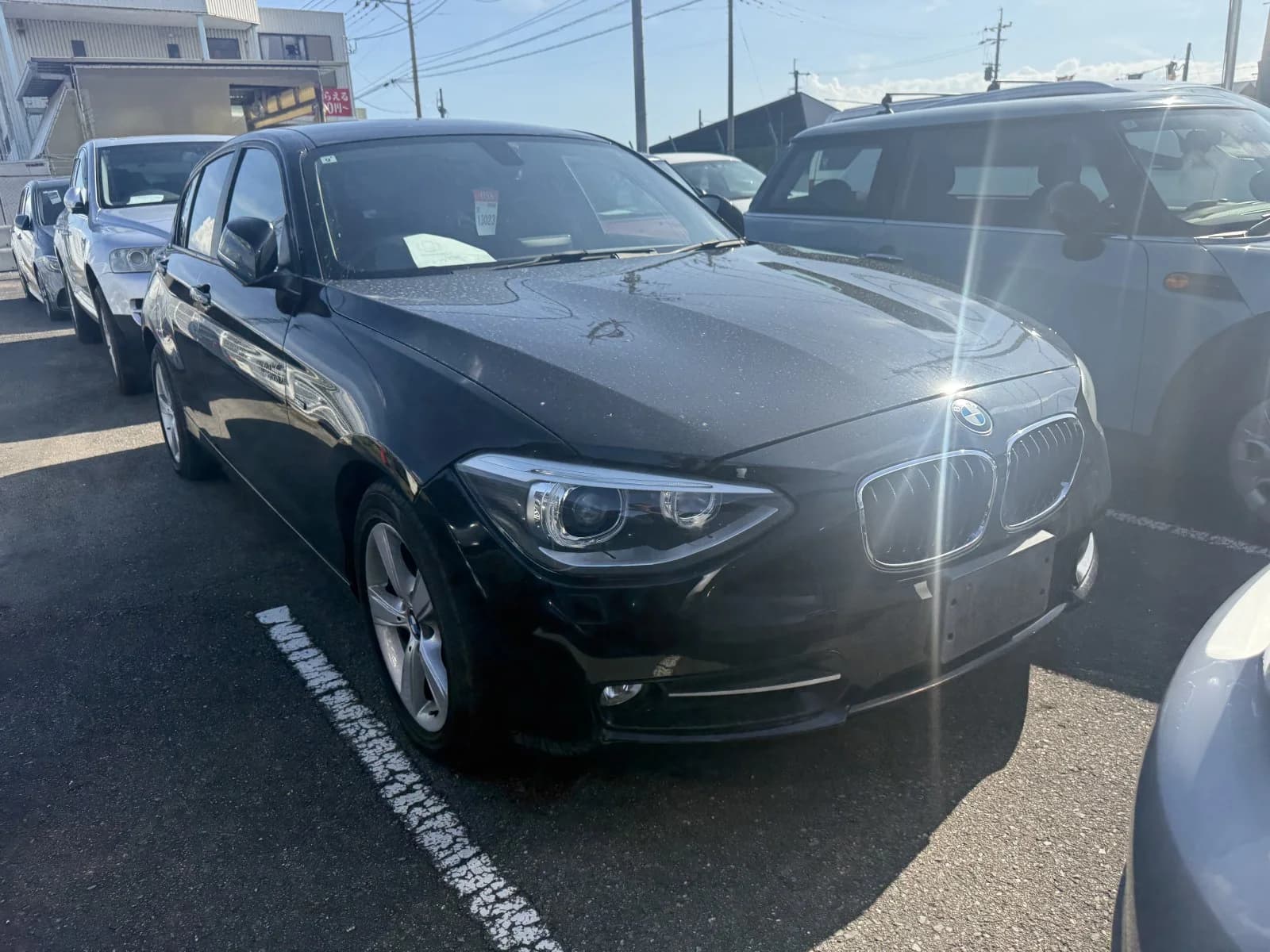 BMW 1 Series compact sedan front 3/4 view
