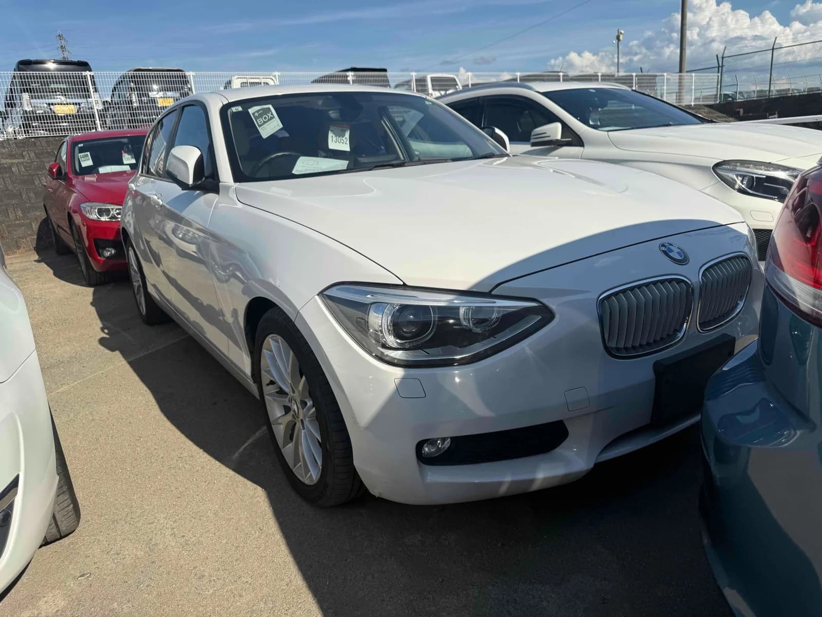 BMW 1 Series compact sedan front-left 3/4 view