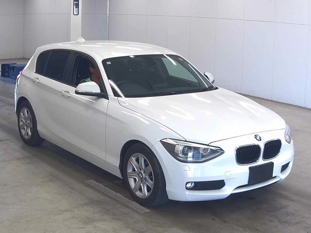 BMW 1 Series compact sedan front-left 3/4