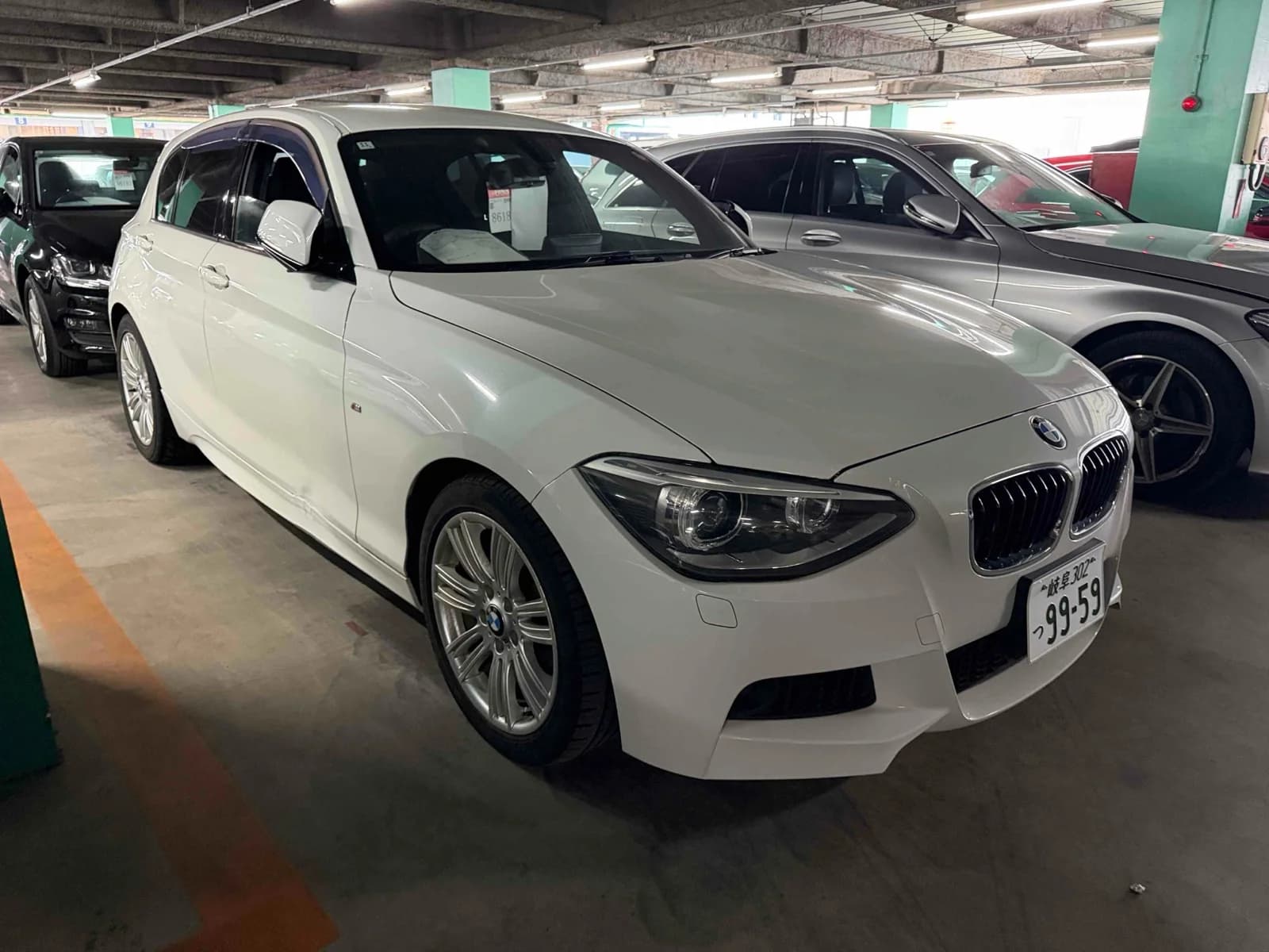 BMW 1 Series sedan front 3/4 view