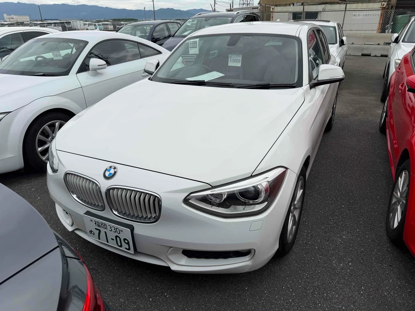 BMW 1 Series sedan front-left 3/4 view