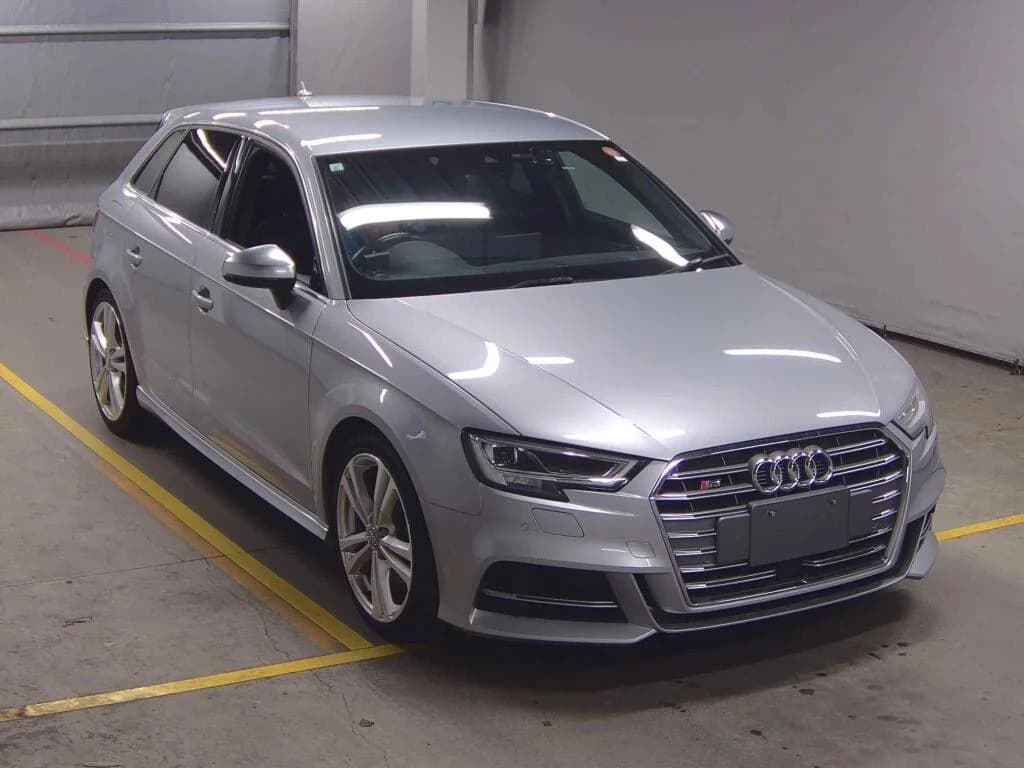 2017 Audi S3 Sportback 2.0 TFSI quattro in silver - front-right 3/4 view with matrix LED headlights, S3 singleframe grille, and 18-inch 5-spoke alloy wheels